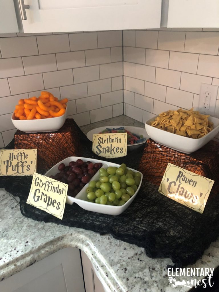 themed snacks for a harry potter party- huffle puffs, gryffindor grapes, slytherin snakes, raven claws