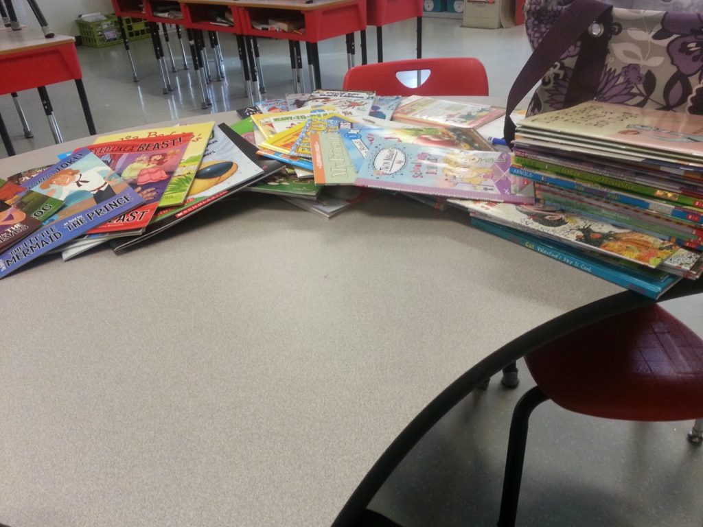 Pile of books on desk