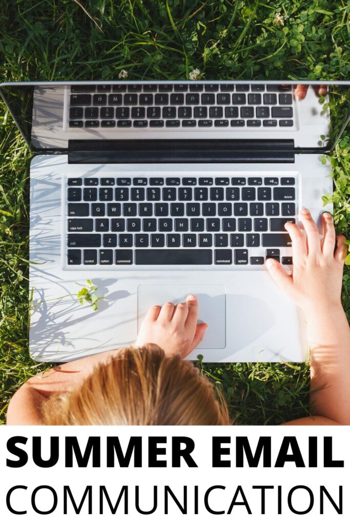 A child typing on a laptop while sitting in the grass, representing student-teacher email check-ins during summer.