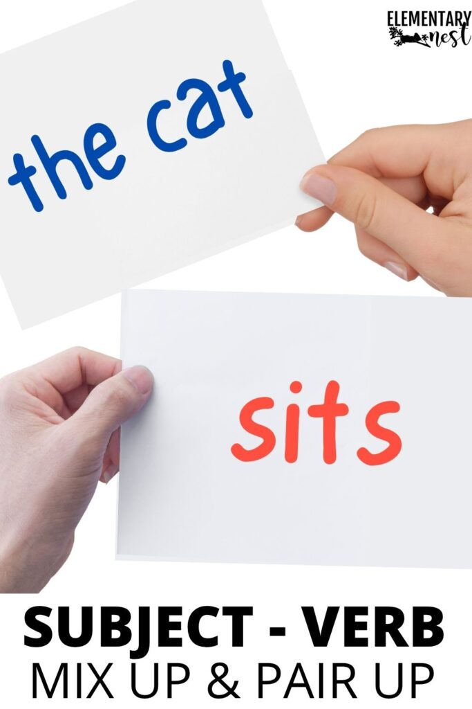 Two hands holding cards that say “the cat” and “sits” for a subject verb agreement match-up activity.