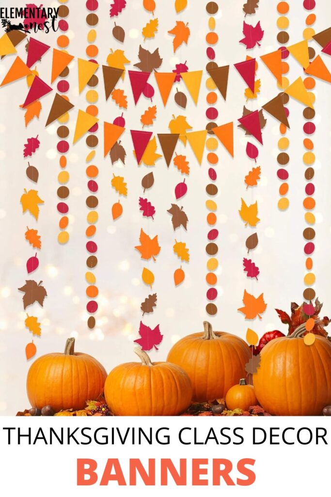 Thanksgiving classroom banners made with orange, yellow, and red paper leaves and triangles