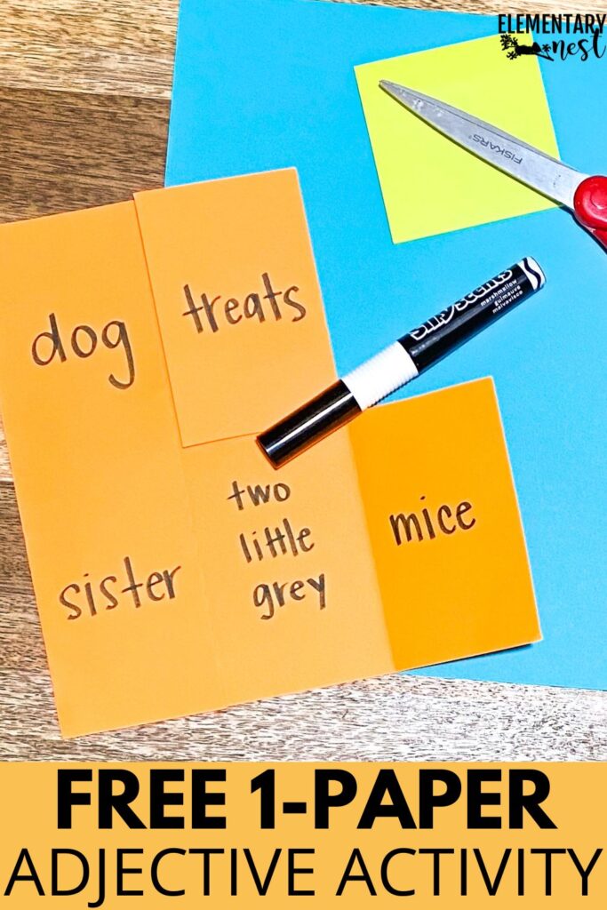 Orange paper folded into flaps showing adjective examples like “two little grey mice”